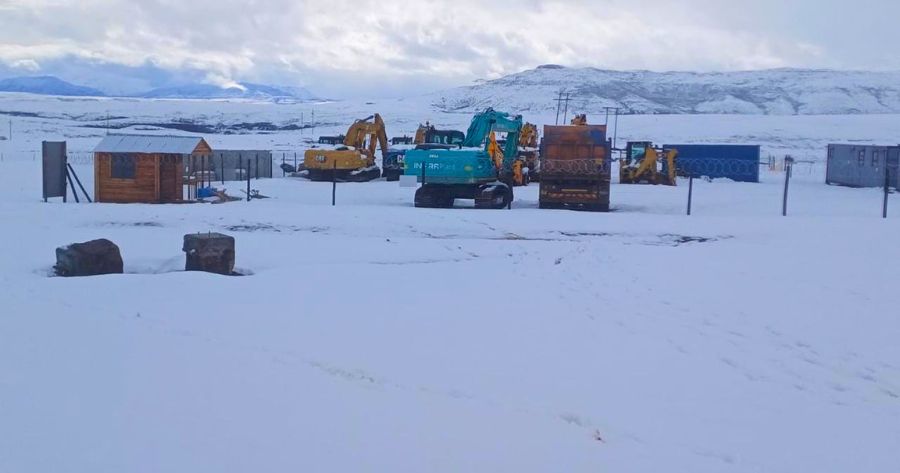 Snow-covered Barkly East construction site during severe winter weather